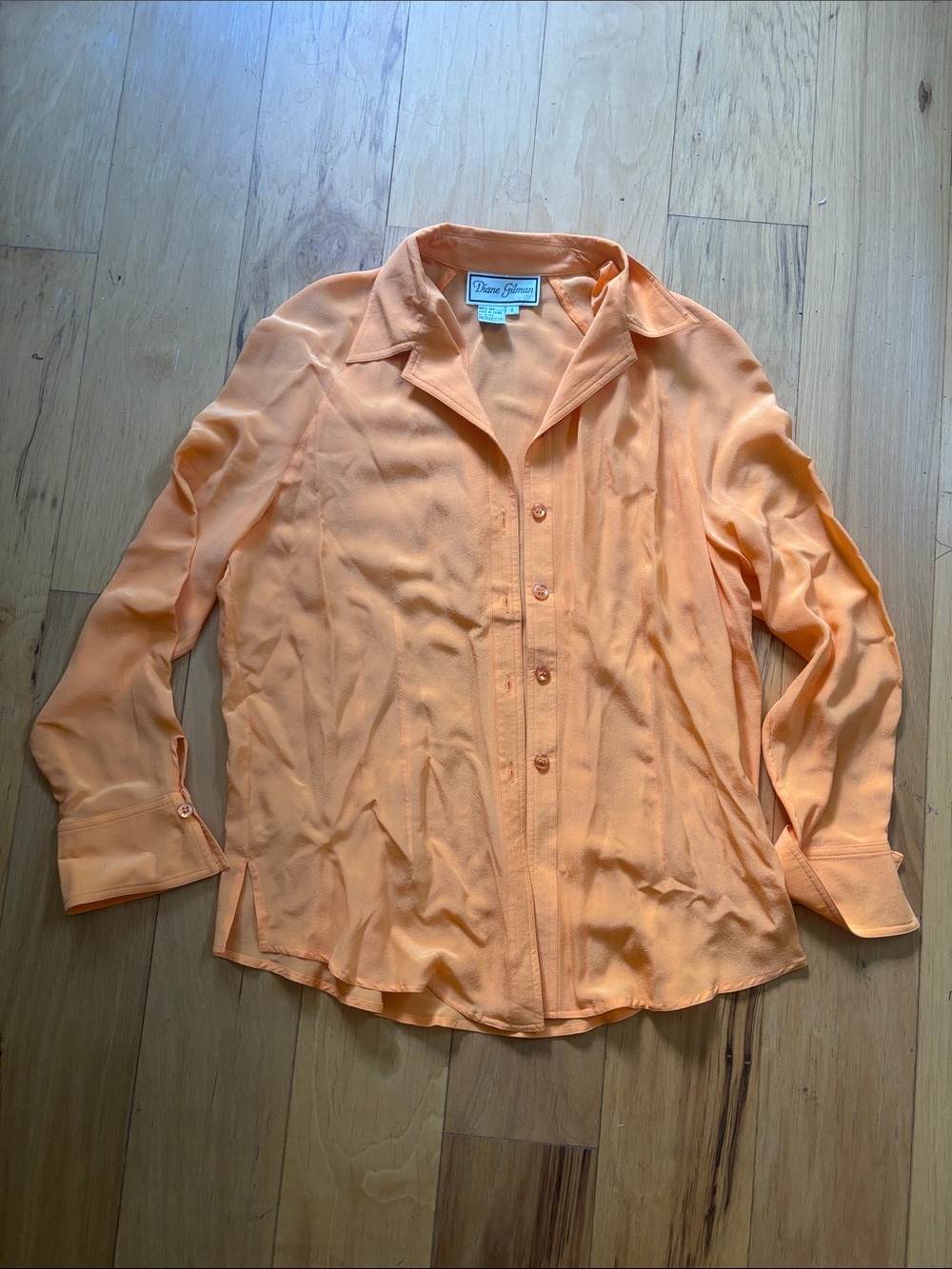 Diane Gilman orange silk blouse size small.